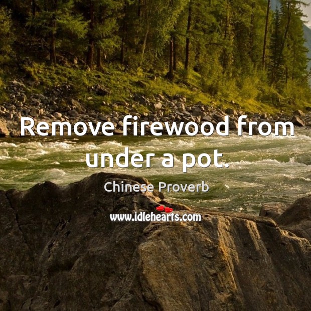 Remove firewood from under a pot. Image