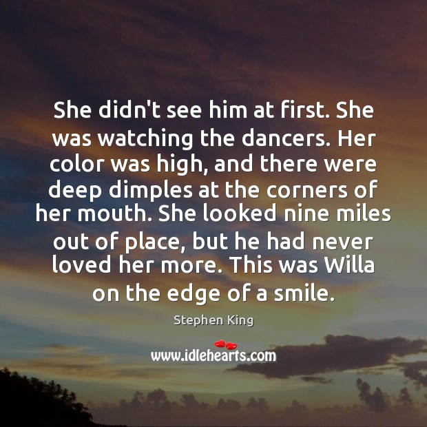 She didn’t see him at first. She was watching the dancers. Her Image