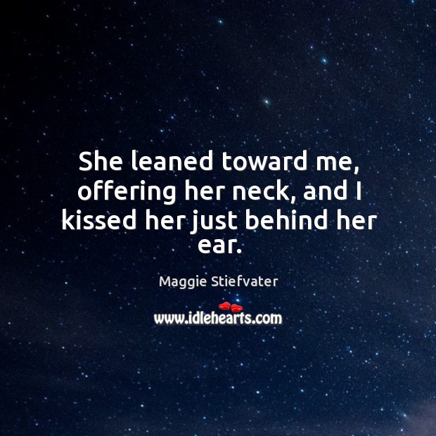 She leaned toward me, offering her neck, and I kissed her just behind her ear. Image