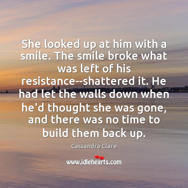 She looked up at him with a smile. The smile broke what Image