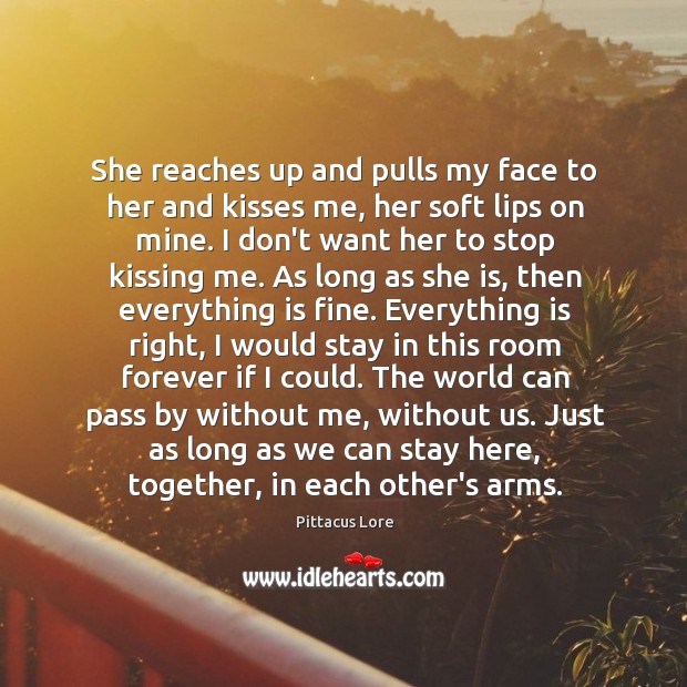 She reaches up and pulls my face to her and kisses me, Pittacus Lore Picture Quote
