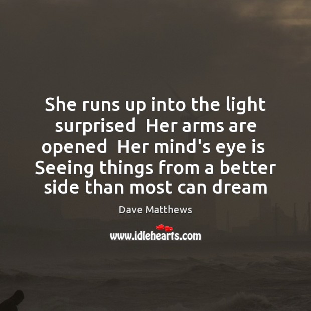 She runs up into the light surprised  Her arms are opened  Her Image