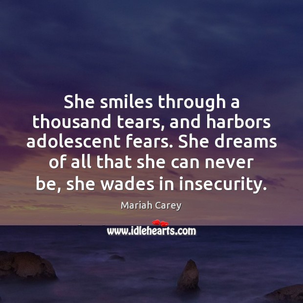 She smiles through a thousand tears, and harbors adolescent fears. She dreams Mariah Carey Picture Quote