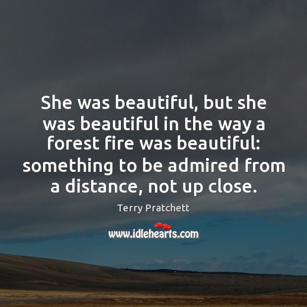 She was beautiful, but she was beautiful in the way a forest Terry Pratchett Picture Quote