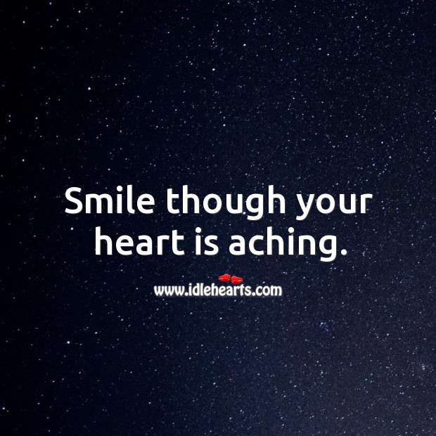Smile though your heart is aching. Image
