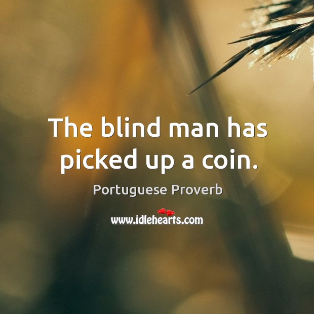 The blind man has picked up a coin. Image