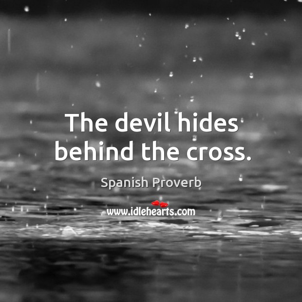 The devil hides behind the cross. Image