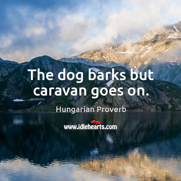 The dog barks but caravan goes on. Image