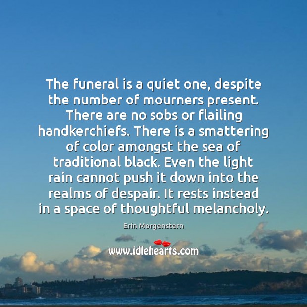 The funeral is a quiet one, despite the number of mourners present. 