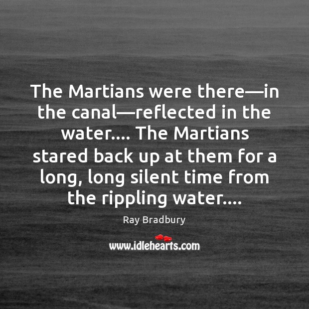 The Martians were there—in the canal—reflected in the water…. The 