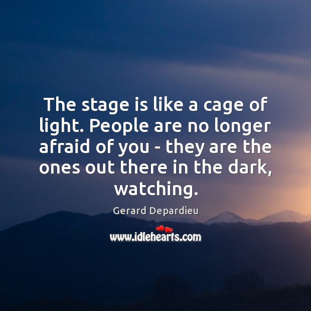 The stage is like a cage of light. People are no longer 