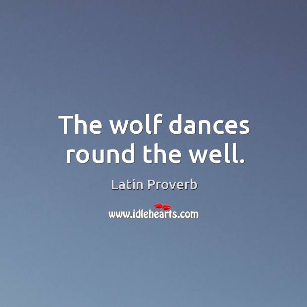 The wolf dances round the well. Image