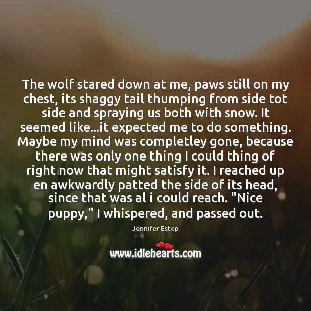 The wolf stared down at me, paws still on my chest, its Jennifer Estep Picture Quote