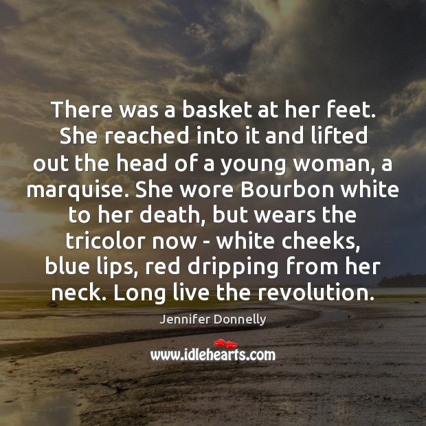 There was a basket at her feet. She reached into it and Image