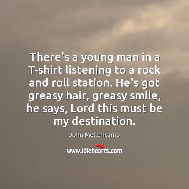 There’s a young man in a T-shirt listening to a rock and Image