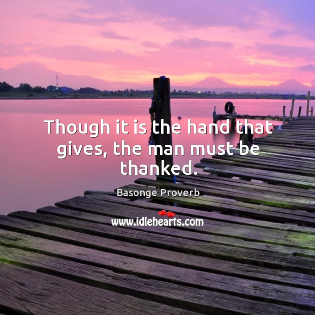 Though it is the hand that gives, the man must be thanked. Basonge Proverbs Image