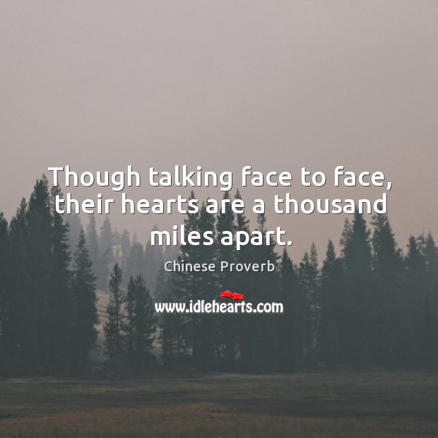 Though talking face to face, their hearts are a thousand miles apart. Chinese Proverbs Image