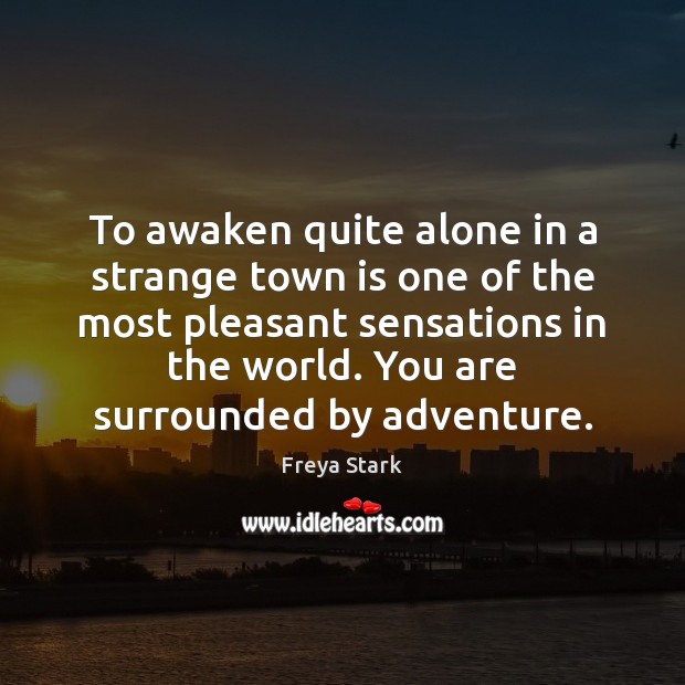 To awaken quite alone in a strange town is one of the Freya Stark Picture Quote