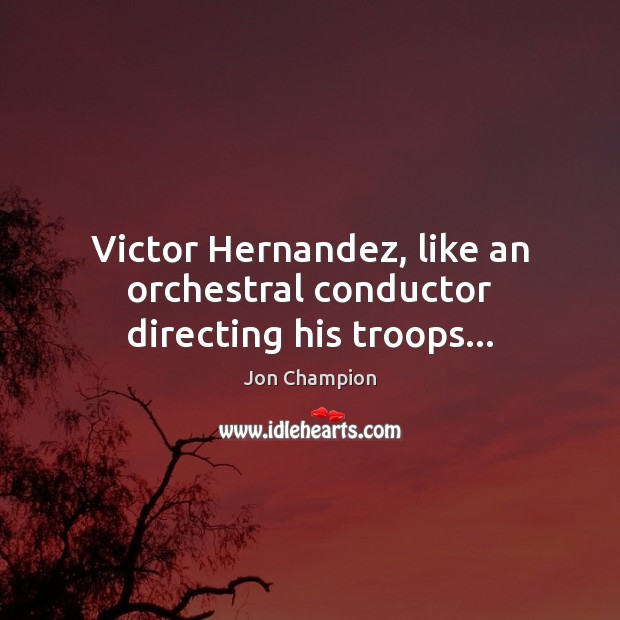 Victor Hernandez, like an orchestral conductor directing his troops… Image