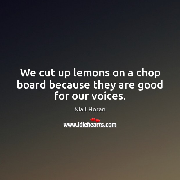 We cut up lemons on a chop board because they are good for our voices. Image