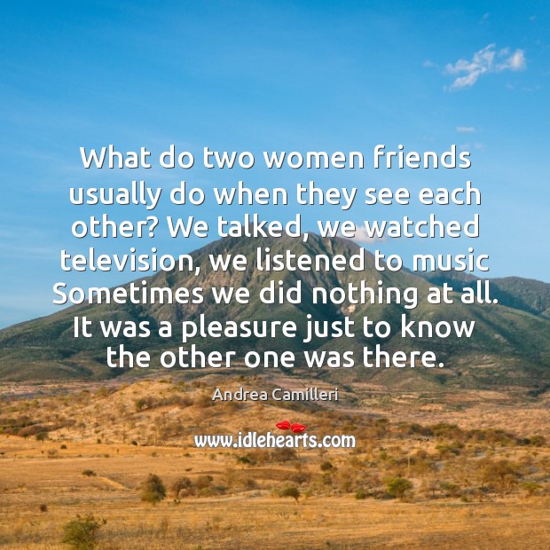 What do two women friends usually do when they see each other? Image