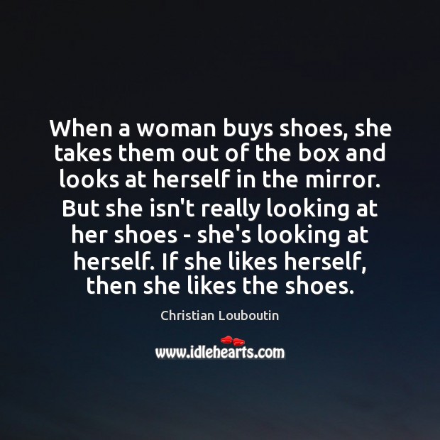 When a woman buys shoes, she takes them out of the box Image
