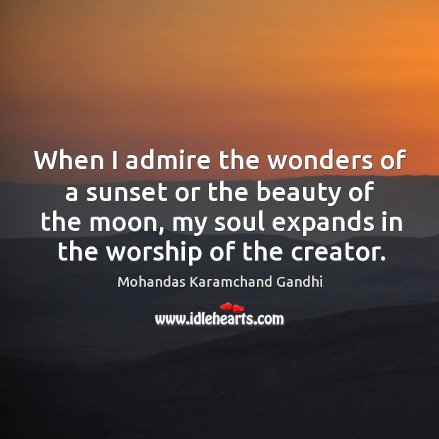 When I admire the wonders of a sunset or the beauty of the moon Mohandas Karamchand Gandhi Picture Quote