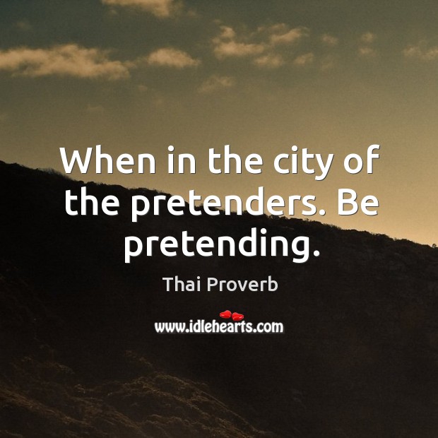 When in the city of the pretenders. Be pretending. Thai Proverbs Image