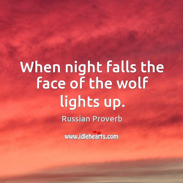 When night falls the face of the wolf lights up. Russian Proverbs Image