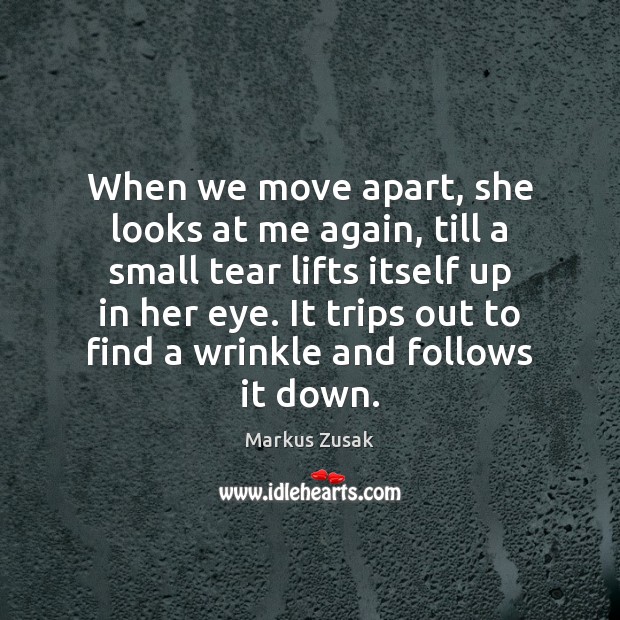 When we move apart, she looks at me again, till a small Markus Zusak Picture Quote