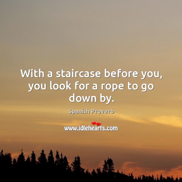 With a staircase before you, you look for a rope to go down by. Image