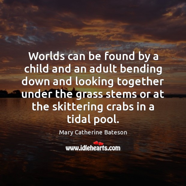 Worlds can be found by a child and an adult bending down Image