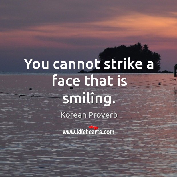You cannot strike a face that is smiling. Image