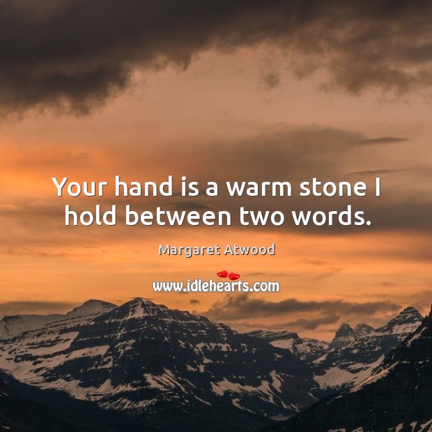 Your hand is a warm stone I hold between two words. Image